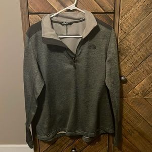 Women’s heathered gray, fleece lined quarter zip.